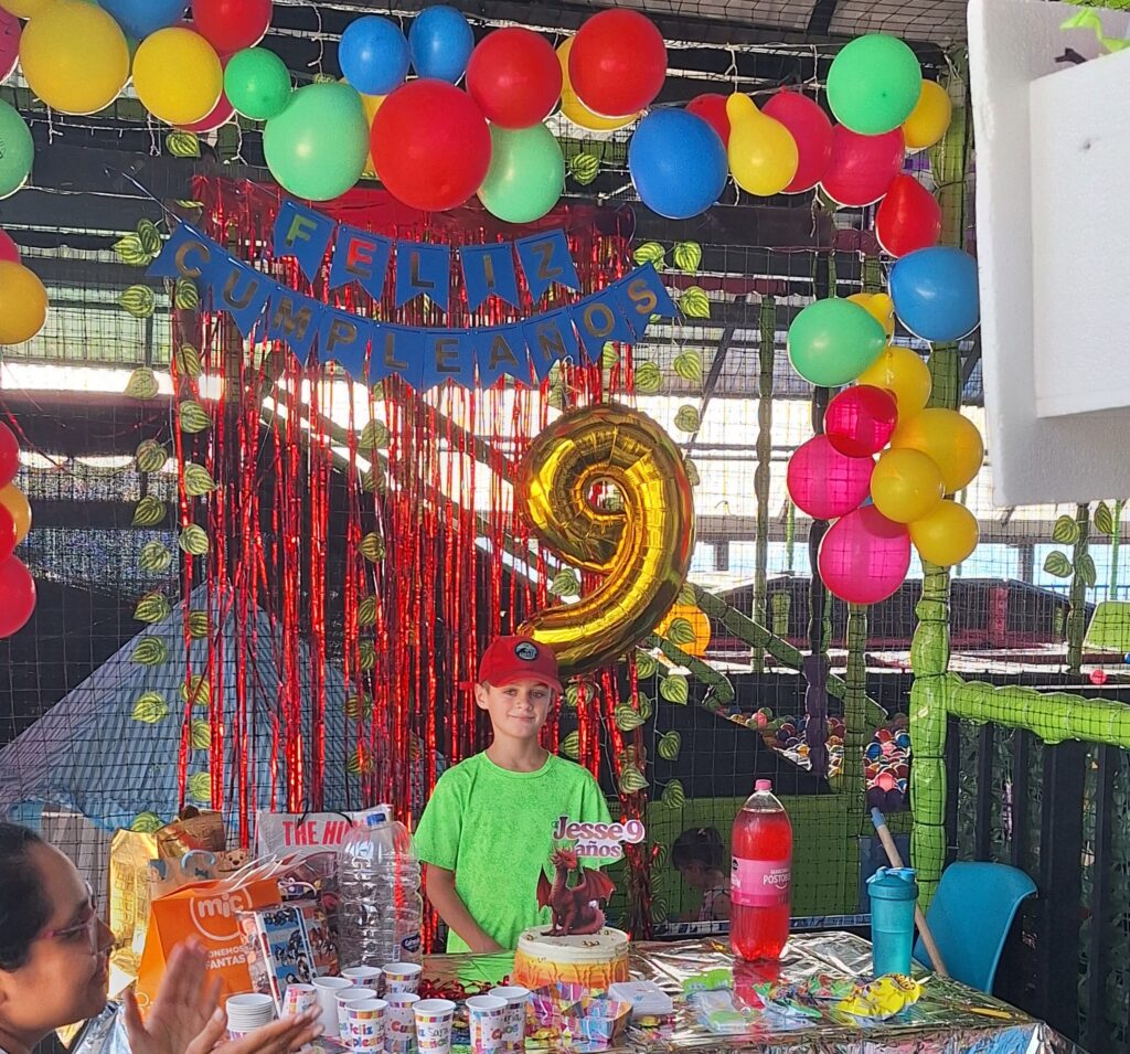 Friends and family sing to Jesse Sharp at his 9th birthday party at the local trampoline park. Photo by Laura Sharp.