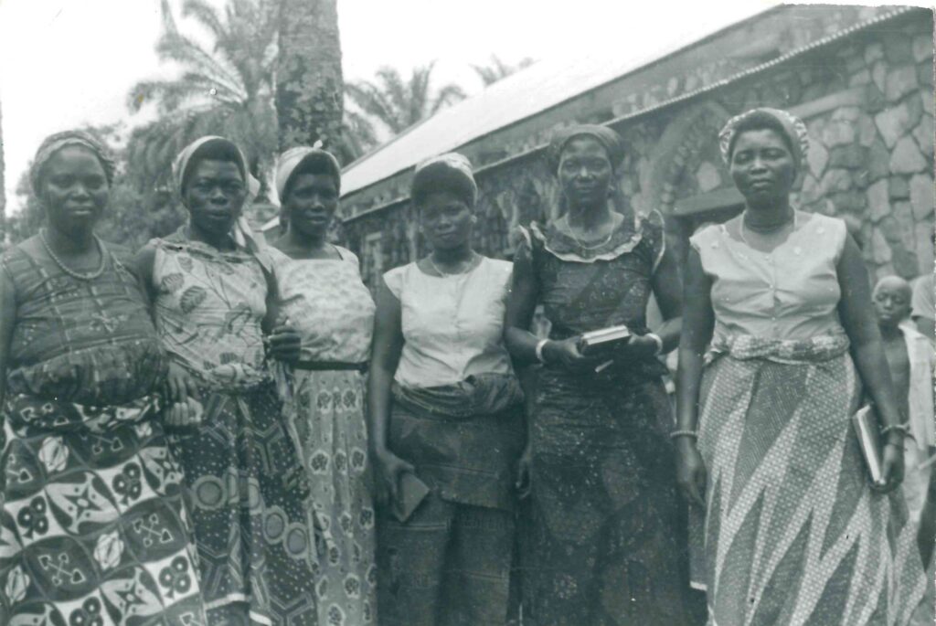 Congo Mennonite Church women church leaders in Nyanga in the 1950s, (second from left) Esther Kholoma and (fifth from left) Rebecca Sengu. Photo credits: Africa Inter-Mennonite Mission Records in MCUSA archives.
In church, Sengu was an assertive woman. She would debate with the male church leaders in meetings about the importance of women taking their God-given places in the church. Sometimes, she would preach.