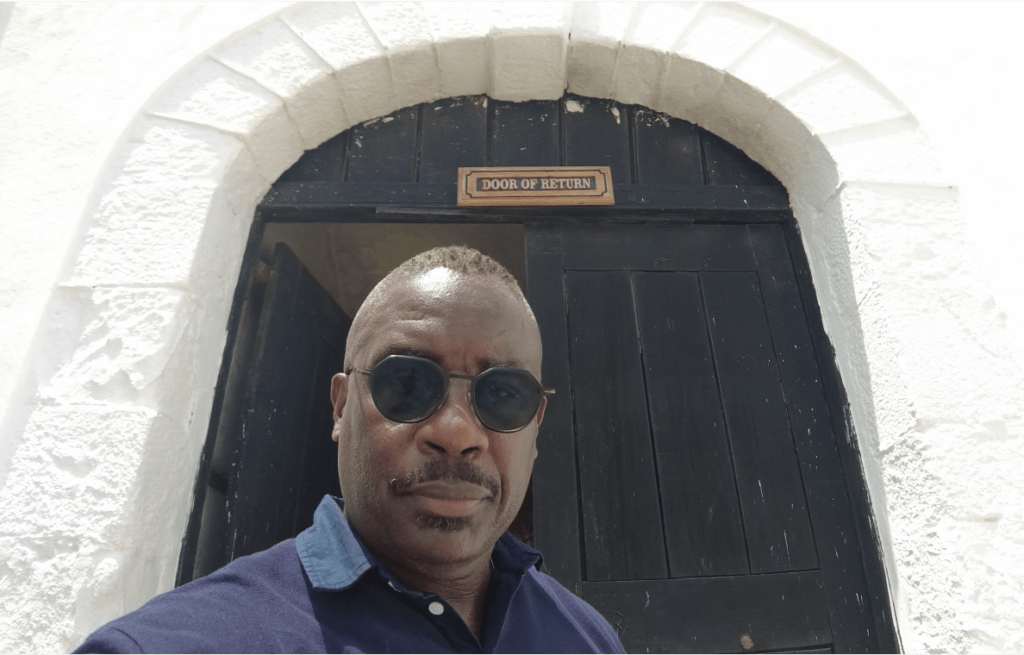 Wil LaVeist at the opposite side of the “Door of No Return” that was renamed “Door of Return” to welcome descendants from the diaspora of enslaved Africans. Photo by Wil LaVeist.