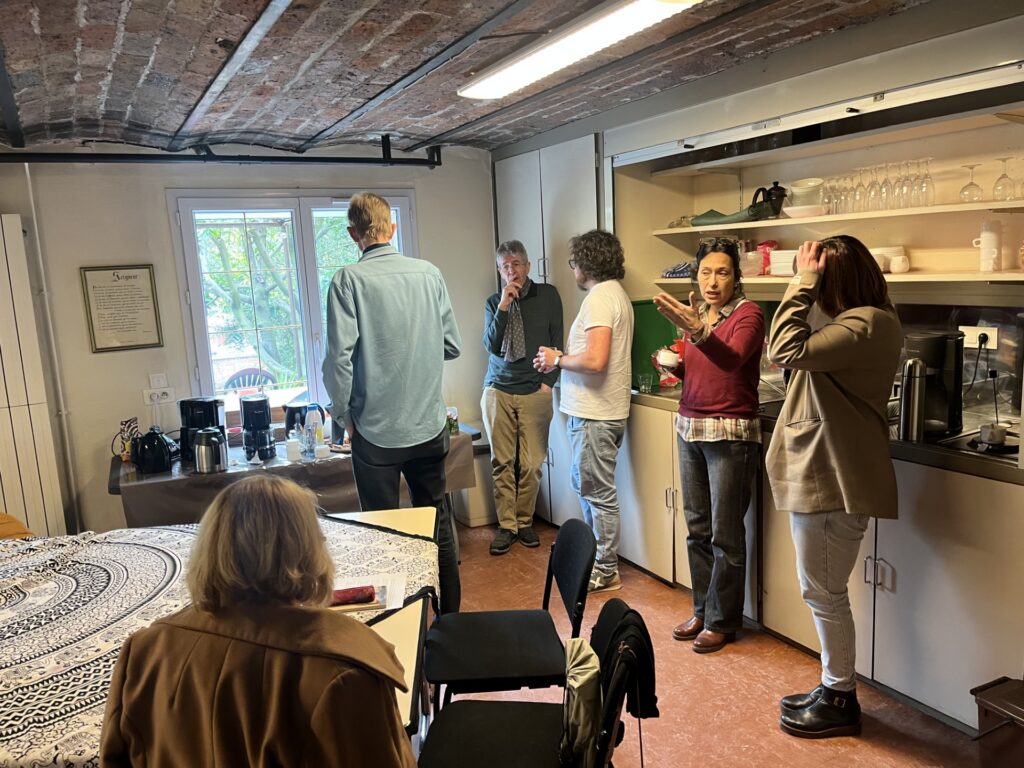 Round table participants enjoy casual exchanges during a break