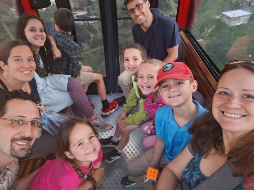 Laura's cousin, Amaris Allan, her husband, Stuart, and their children are pictured with the Sharp family on a cable car overlooking El Paraíso in south Bogotá on June 14, 2026. Their relatives were visiting from Pennsylvania.
Photo by Laura Sharp.