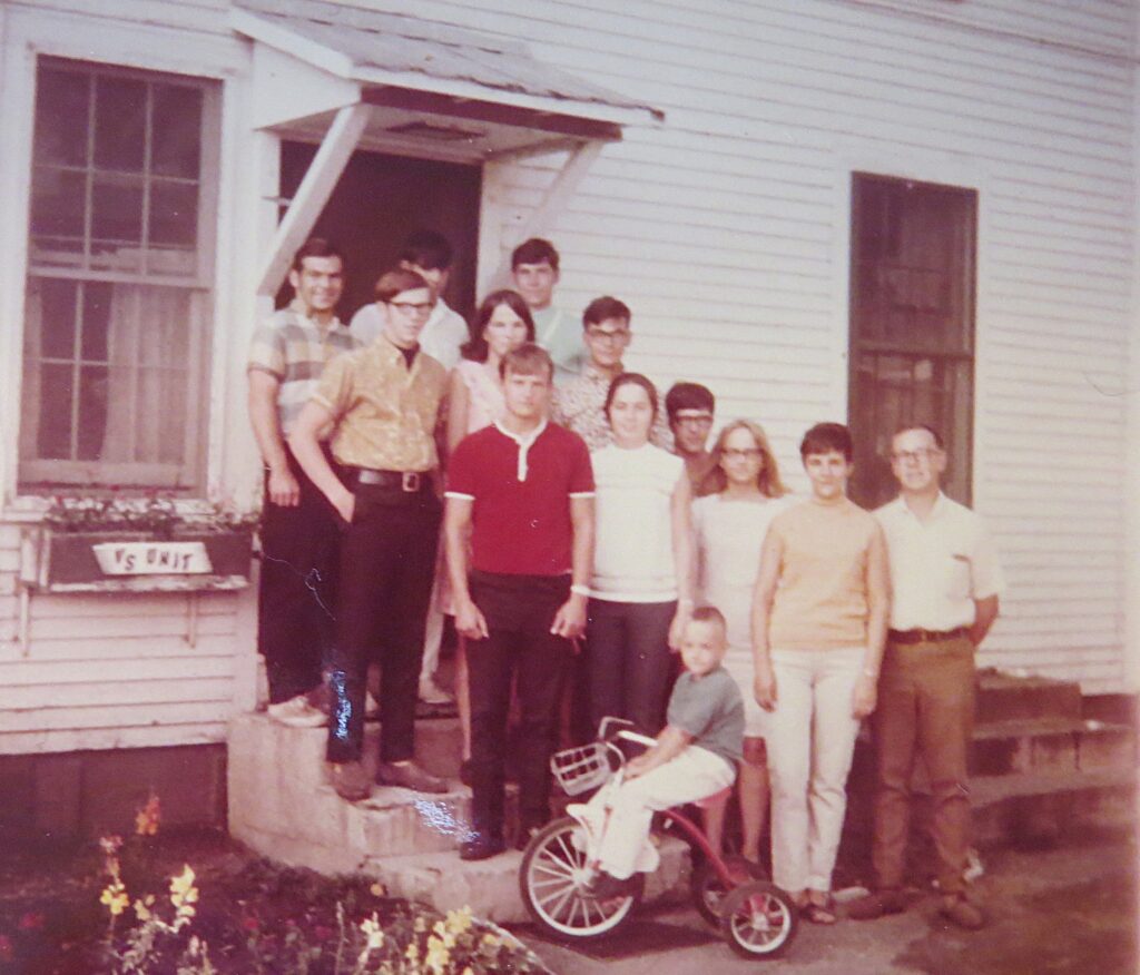 In the summer of 1969, the VSers posed for a photo outside the hospital. From back, left: Earl Hofstetter, Dave Marsh, Roland King
Don Esh, Rita. Stutzman, Roland Seiler, Wesley Gingrich, Teresa Seiler, Fred Weldy
Joyce Weldy,
Jamie. Sanford on bike, Gloria and Sanford Bender.