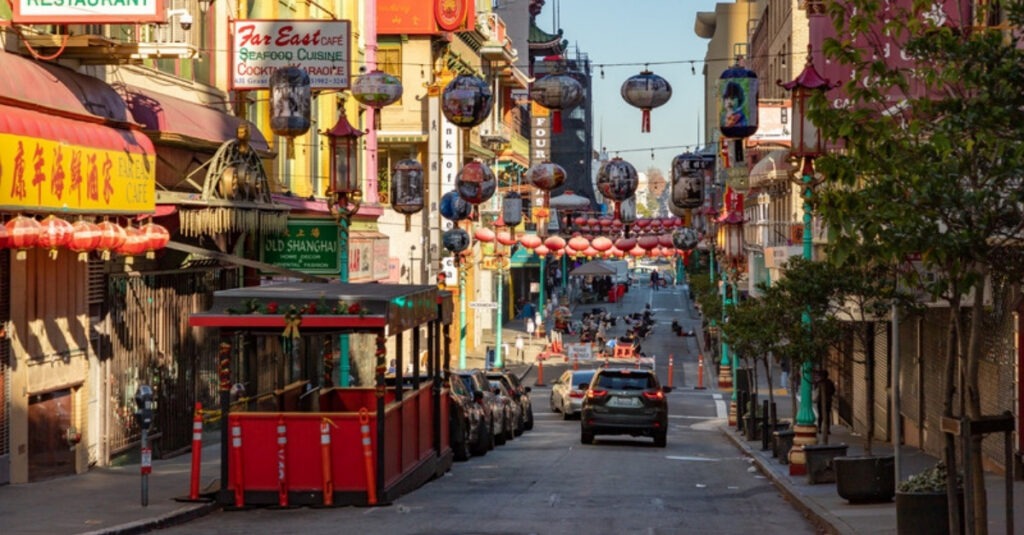 Grant Avenue in San Francisco's Chinatown, lined with shops and red paper lanterns strung overhead