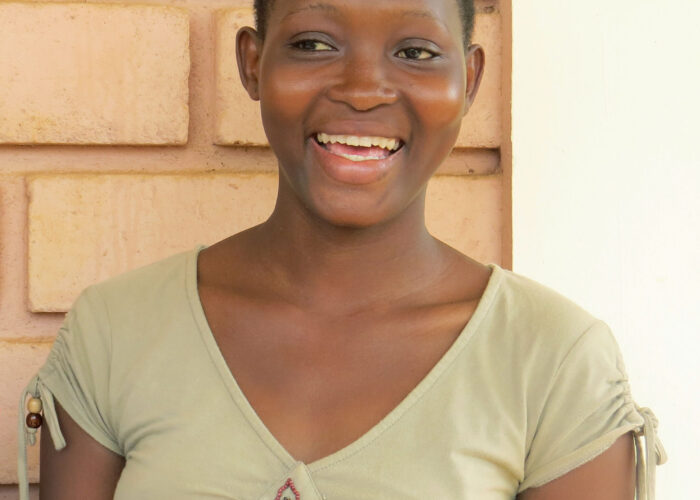 Mawuli  talks about how God used La Casa Grande in Benin to give her hope and a future. Photo by Lynda Hollinger-Janzen. Download full-resolution image.