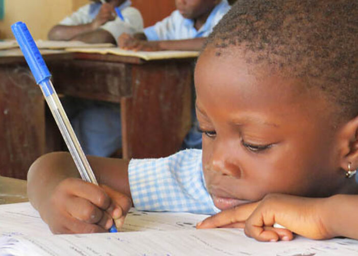 Annoncia concentrates on her assignment at La Casa Grande's school