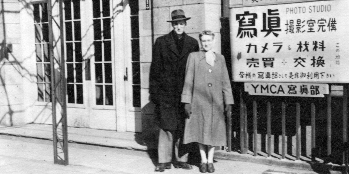 Genevieve and Ralph Buckwalter in front of a YMCA in Japan in 1950