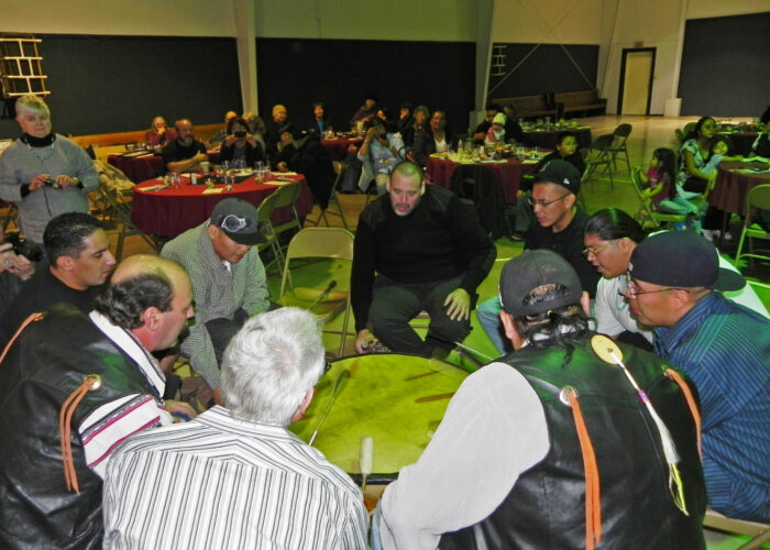 Worship around a drum at the beginning of a Navajo BIC Overcomers rehab meeting at the Navajo Brethren in Christ Mission in New Mexico. Photo submitted. Download full resolution image.