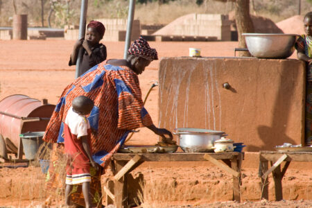 A woman in Burkina Faso prepares food.