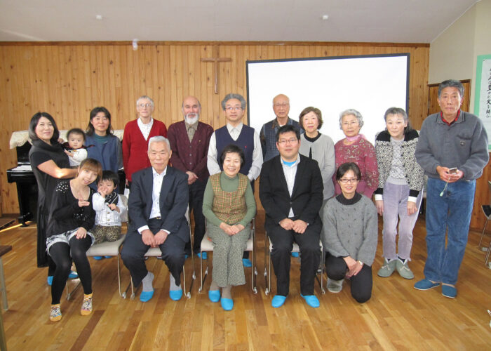 Members of Mennonite churches in Japan shown here are among those who are re-emphasizing peace as the nation discusses restoring its military’s ability to go to war outside of Japan’s borders. Back row from left to right: Fumiko Kawaguchi holding baby Oki Kawaguchi