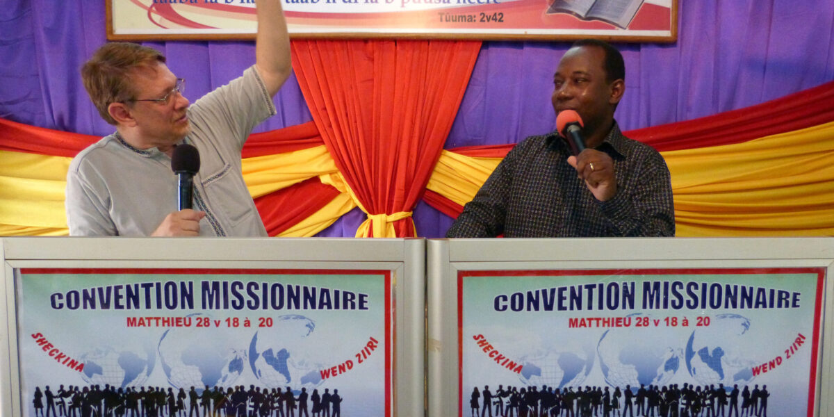 Bill Frisbie and François Xavier Compaoré enjoy teaching together in Burkina Faso. Photo courtesy of Bill Frisbie. Download full resolution image.