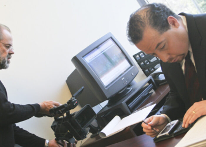 Burton Buller prepares to videotape Ray sharing his story of mental illness and homelessness for the Shadow Voices: Finding Hope in Mental Illness documentary.Download high-resolution photo