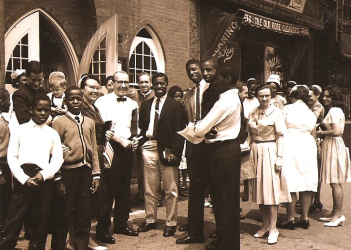 ​From left to right (in the middle of the picture) is the late Ethel M. Zeager (wearing a covering and glasses and holding a Bible)