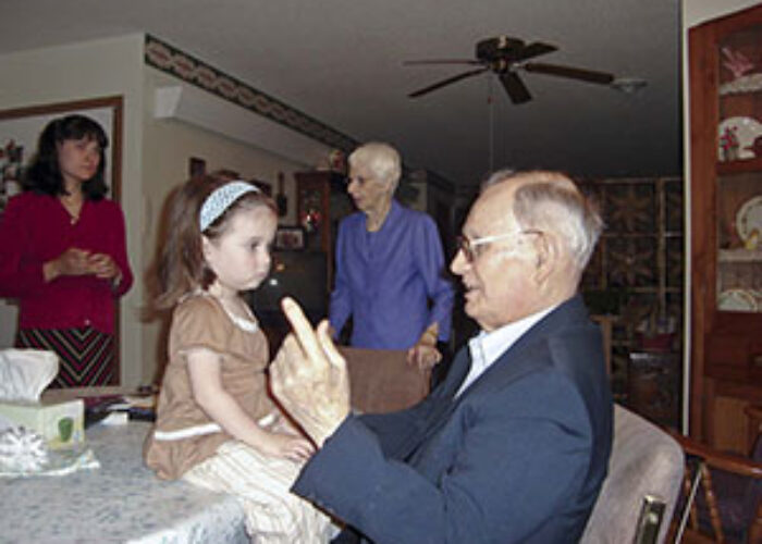 Eugene Blosser (1917-2008) with granddaughter Hannah.