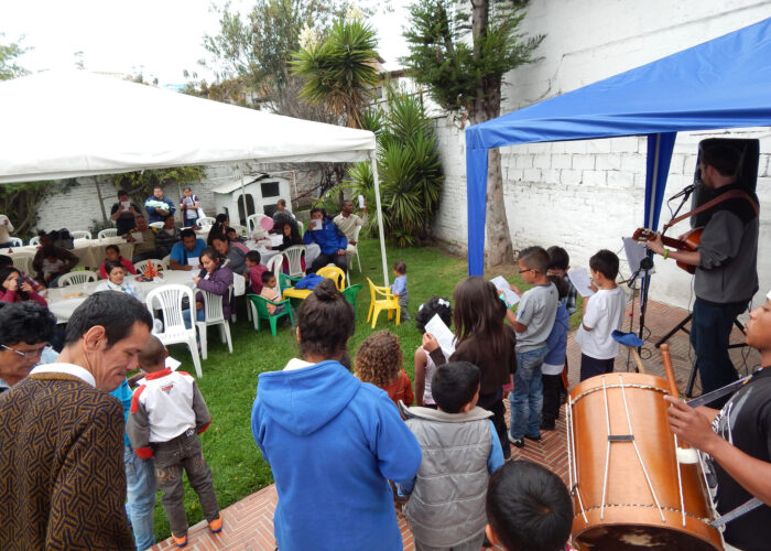 A band plays traditional Colombian Christmas songs during the Colombian Refugee Project's Christmas party. Photo provided by David Shenk. Download full resolution image.