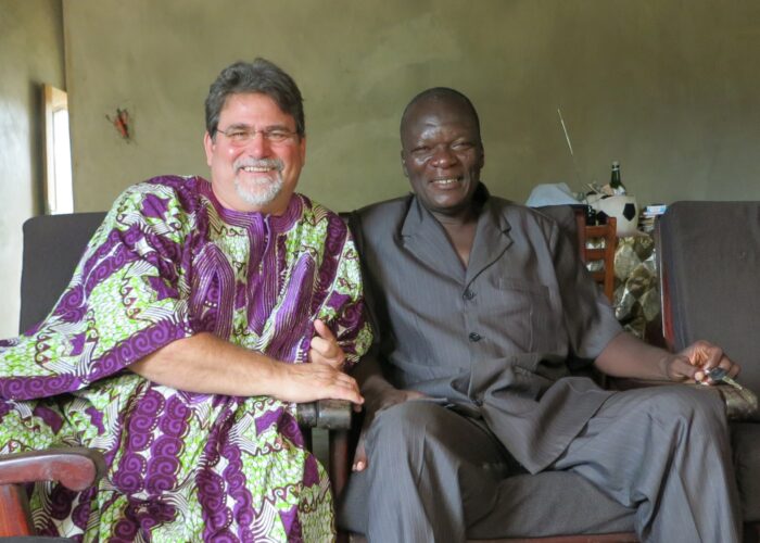 Steve Wiebe-Johnson converses with Théophane Boko in Cotonou