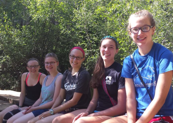 Members of the Colorado Springs Service Adventure unit take a break during a hike.  Left to right:  Franzi Klause