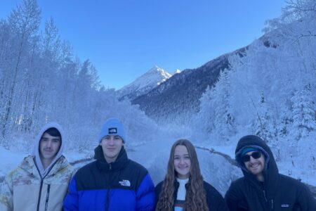 The 2025-26 Anchorage, Alaska, Service Adventure unit . Left to right: Ian Unzicker, Ruben Veigel, Adriana Duerksen and Mir Knego (unit leader). Photo by Michael Oyer.