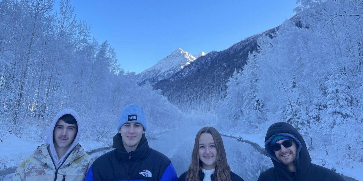 The 2025-26 Anchorage, Alaska, Service Adventure unit . Left to right: Ian Unzicker, Ruben Veigel, Adriana Duerksen and Mir Knego (unit leader). Photo by Michael Oyer.