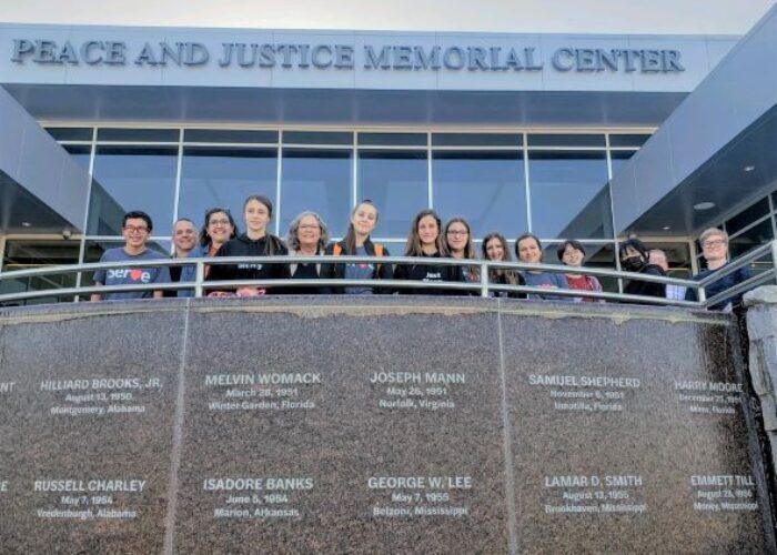 ​EMS Youth Venture E-term participants stand at the Peace and Justice Memorial Center in Montgomery