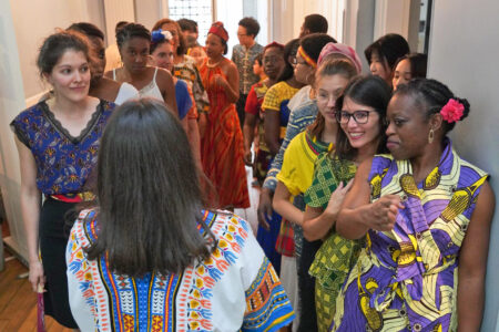 ​Psalt choir members prepare to go on stage for their Aug. 24