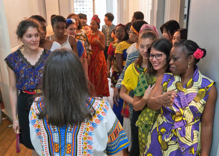 ​Psalt choir members prepare to go on stage for their Aug. 24