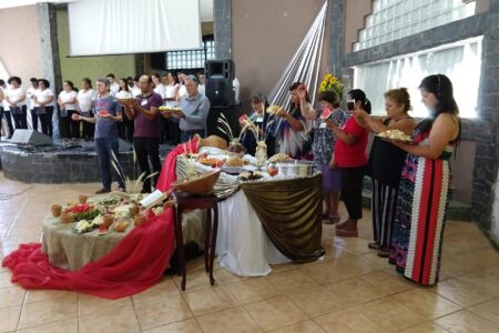 ​Brothers and sisters of the Mennonite churches from across the Southern Cone of South America pray together prior to sharing in communion