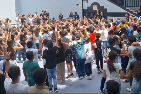 Students and teachers of Colegio Americano Menno dance to celebrate the end of the first semester and a three week break. Photo by Laura Sharp.
