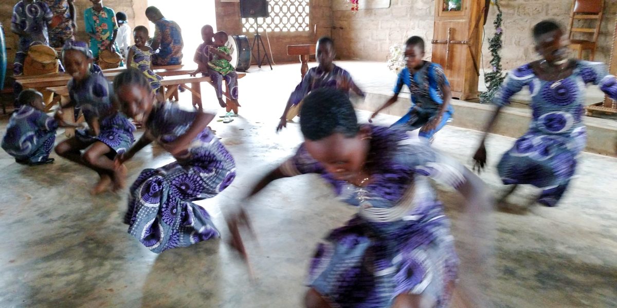 ​​Children dance during a worship service at La Casa Grande