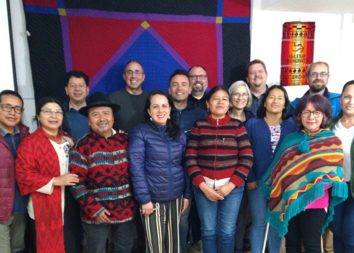 Partnership in front of the partnership quilt made of Ecuadorian fabric, sewn by CPMC people. ICAME with Partnership: Julián Guamán, Elsa Yantalema, Oscar Herrera, Gerónimo Yantalema, Joel Beachy, Daniela Sánchez, Diego Castro, Nathan Luitjens, Margarita de la Torre, Linda Shelly, Andrew Suderman, Alba Silva, Alexandra Meneses, Peter Wigginton, Arianne Isturiz