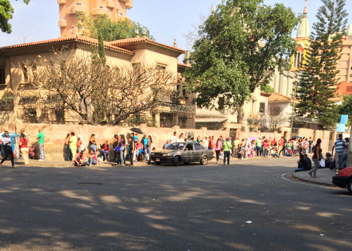 ​People wait in long lines for the chance to buy basic food staples. Photo provided by Marisa Smucker. Click on image for high resolution version.