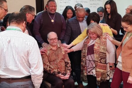Bishop L.W. Francisco (center) of Calvary Community Church