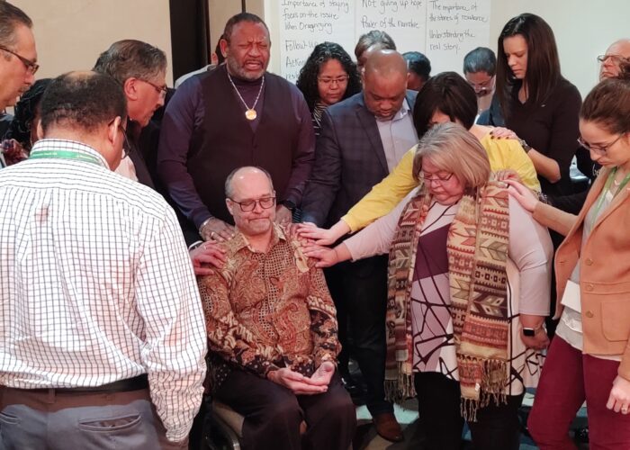 Bishop L.W. Francisco (center) of Calvary Community Church
