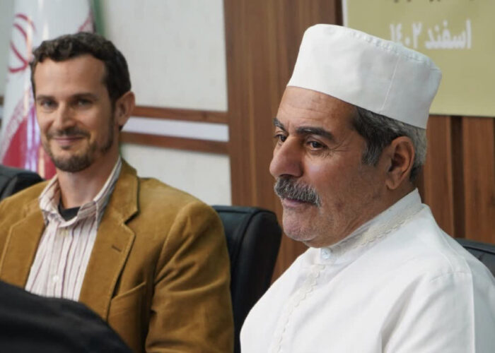 Peter Sensenig and Behzad Nikdin converse at the ISCA conference in Iran. Photographer: Masood Aslani