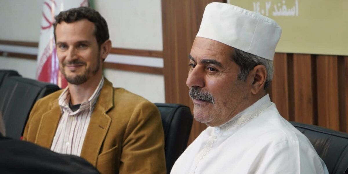 Peter Sensenig and Behzad Nikdin converse at the ISCA conference in Iran. Photographer: Masood Aslani