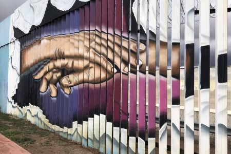​A mural on the Mexico side of the border wall between Agua Prieta