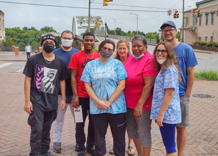 The Youth Venture Civil Rights Learning Tour team in front of the Edmund Pettus Bridge in Selma