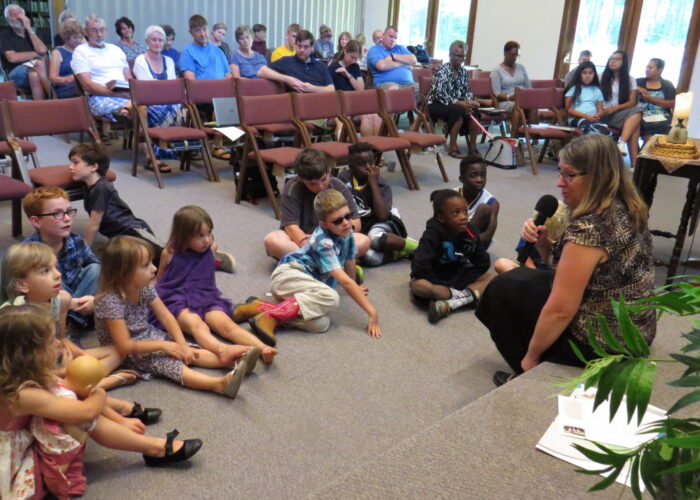 Sandy Miller of Mennonite Mission Network's Work in Progress Ensemble tells the children of Paoli Mennonite Fellowship a story on Sept. 24