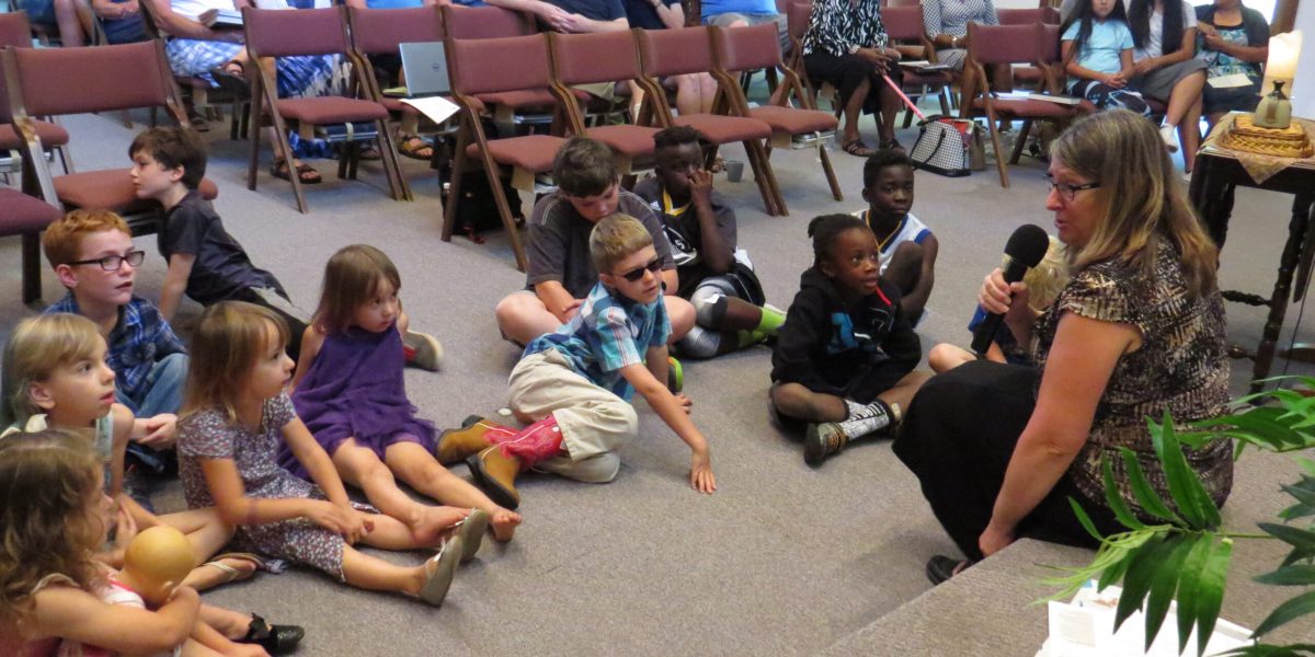 Sandy Miller of Mennonite Mission Network's Work in Progress Ensemble tells the children of Paoli Mennonite Fellowship a story on Sept. 24