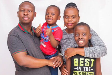 ​Lyenor Lionel Nkosi and his family. (Further information withheld for security reasons.) Photographer: Lucky Nkhurutshi. 