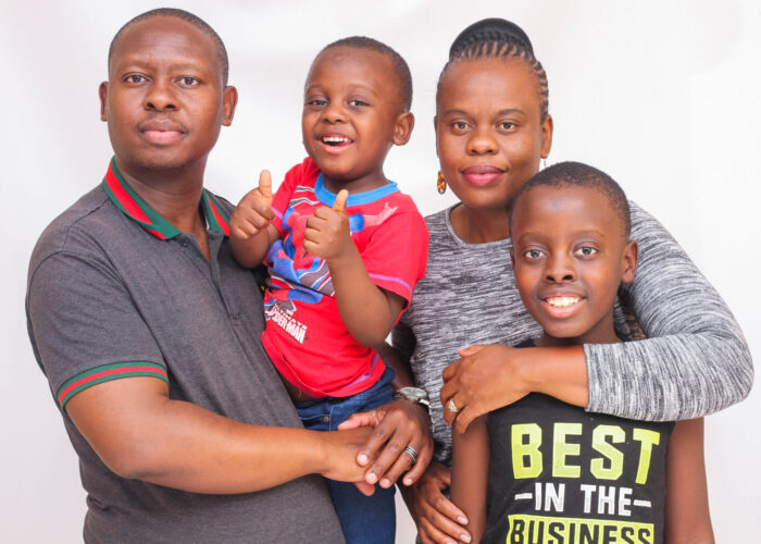 ​Lyenor Lionel Nkosi and his family. (Further information withheld for security reasons.) Photographer: Lucky Nkhurutshi. 