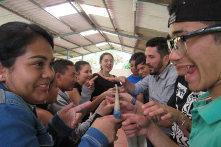 Colombian youth participate in team building fun: in the front is Linda Fabiola Fajardo (left) and Miyer Perez (right). Photo by Eric Frey Martin. 