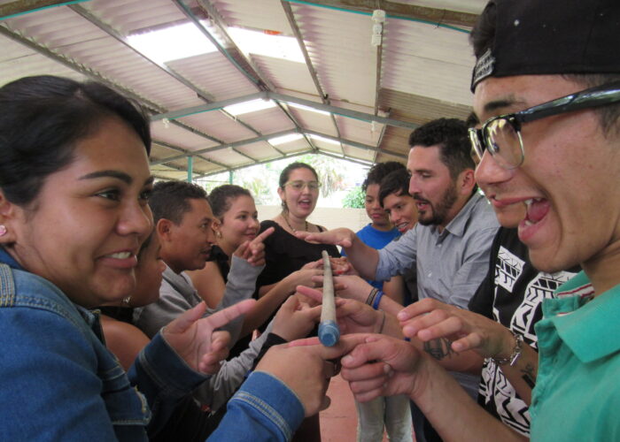 Colombian youth participate in team building fun: in the front is Linda Fabiola Fajardo (left) and Miyer Perez (right). Photo by Eric Frey Martin. 