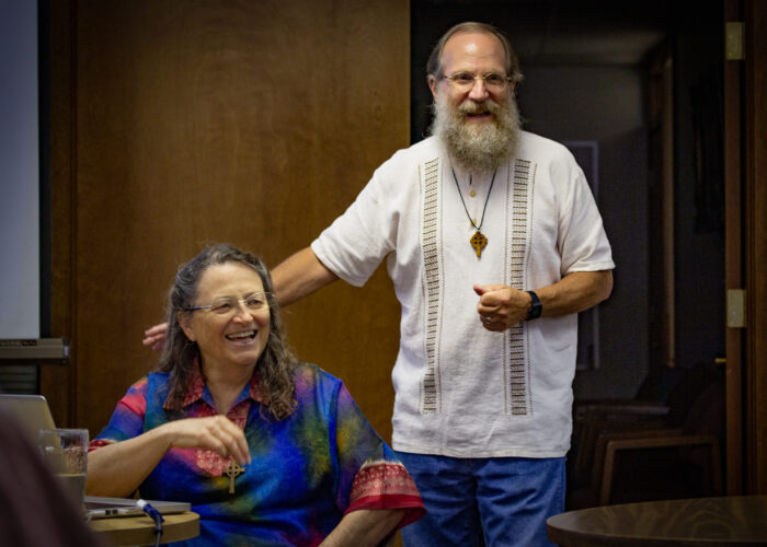 ​Mary and Mark Hurst lead a work presentation in Newton