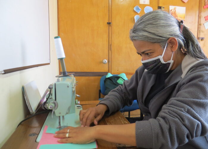 ​Yenny Rangel sews COVID-19 face masks at the Teusaquillo Mennonite Church in Bogotá