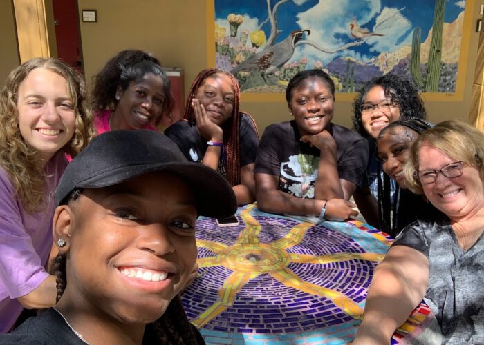 ​Participants in the Youth Venture Borderlands Learning Tour trip gather around for a selfie. For more photos of this trip