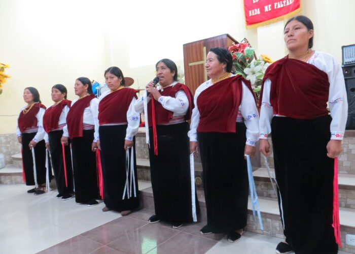 A choral group of women perform at an event celebrating 30 years of Anabaptist presence in Ecuador. The event was attended by Mennonites from the two Mennonite denominations in Ecuador