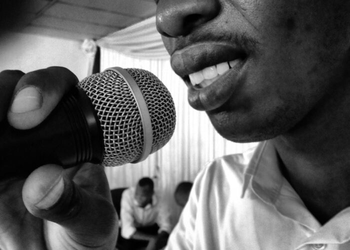 ​Baamuchili Settler prepares to lead worship. His congregation plays a major role in the prison ministry in Botswana. (This photo was not taken in the prison where photography is illegal.) Photographer: Nathan Dirks. Click image for high resolution version.