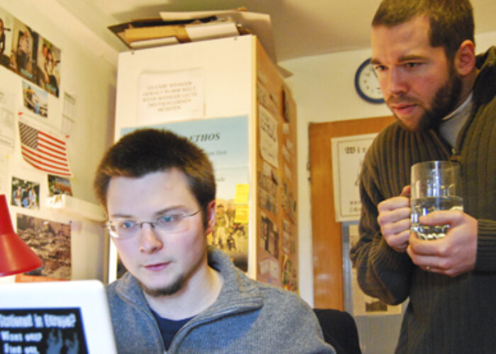 Daniel Hershberger (right) and Marius van Hoogstraten at work in the Military Counseling Network office. (Photo provided)Download high-resolution image