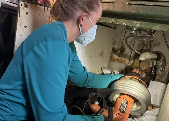 Tucson MVSer Hannah Lehman does home repairs on the job with Community Home Repair Projects of Arizona. Its goal is to help alleviate the effects of poverty by providing home repair services to low-income people of diverse backgrounds.