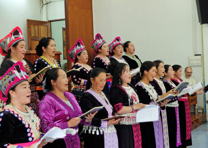 The women’s singing group of the Khun Klang church performs during a church service.